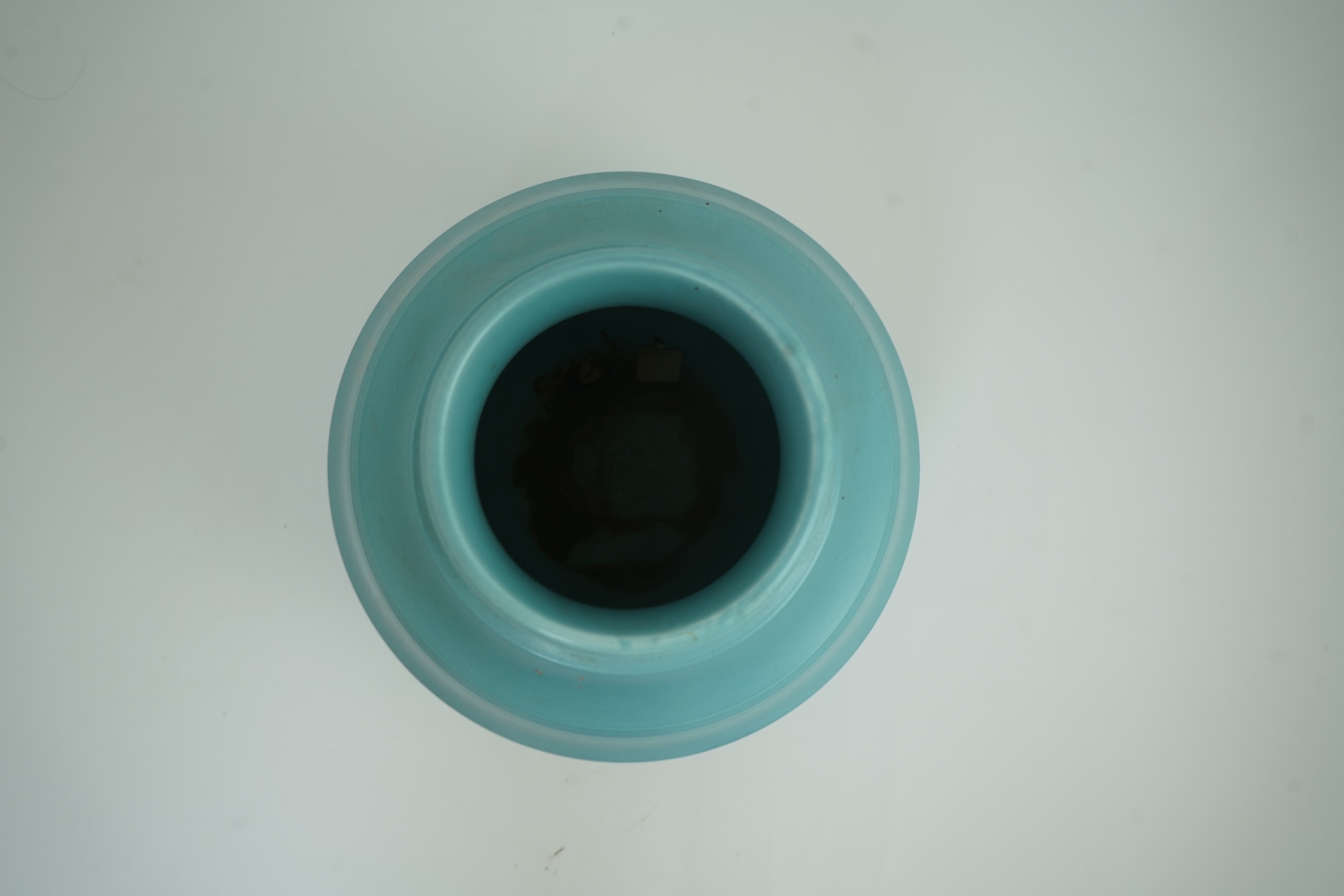Keith Murray MC RDI FRIBA (New Zealand/British, 1892-1981) for Wedgwood: A matt blue glazed globe vase
